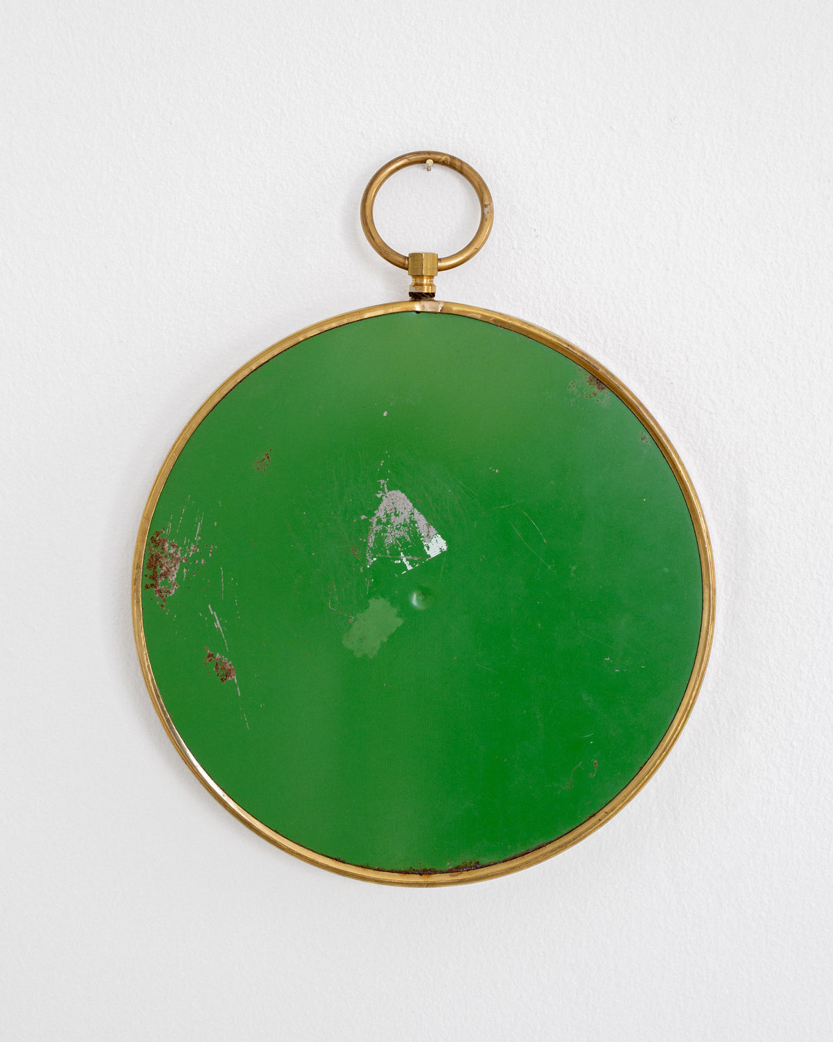 Scandinavian Mid-Century Round Brass Mirror — close-up of green back with brass frame