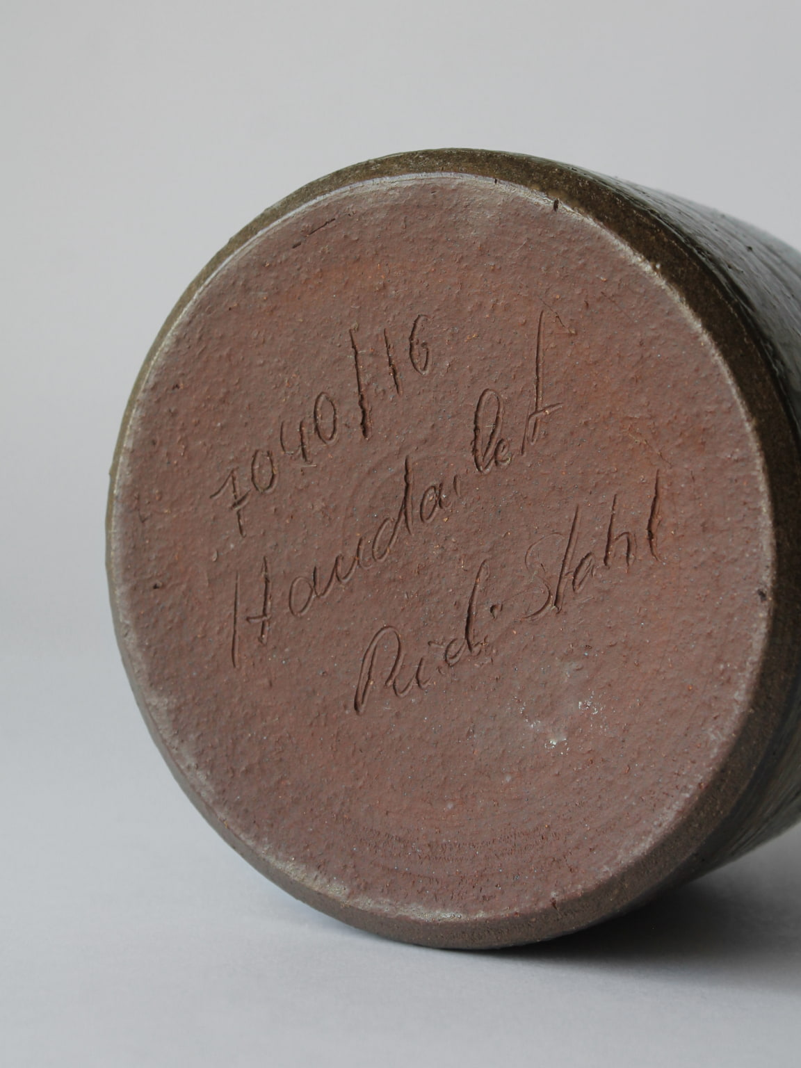 Bottom signature detail of Rudi Stahl ceramic vase showing potter's mark