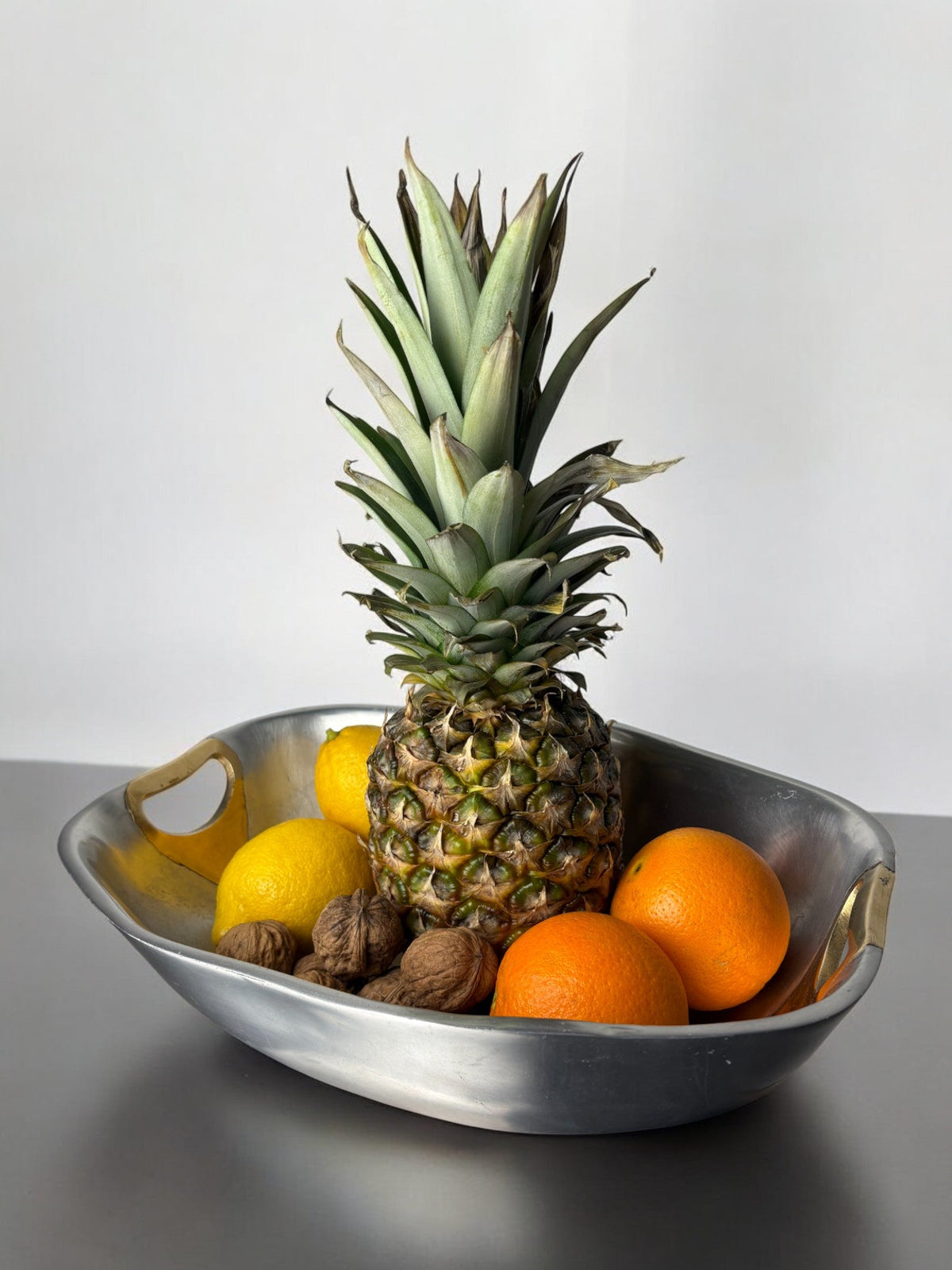 Brutalist Centerpiece by Ardisur, Spain, circa 1970's — side angle with fruits in metal bowl