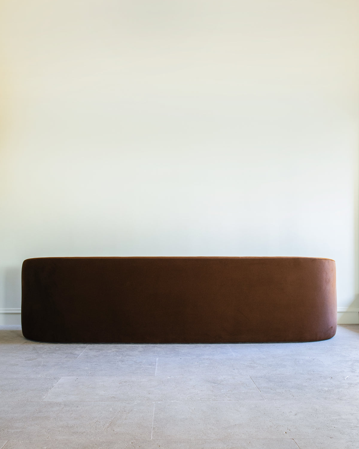 Brown leather Trousdale sofa front view by Studio OSKLO