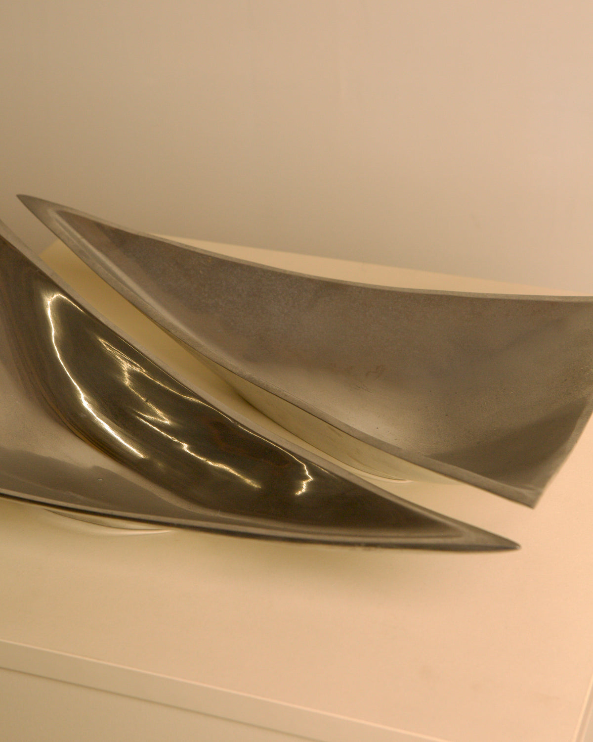Pair of Italian "Triangle" aluminium catch-alls, 1980s — detail view