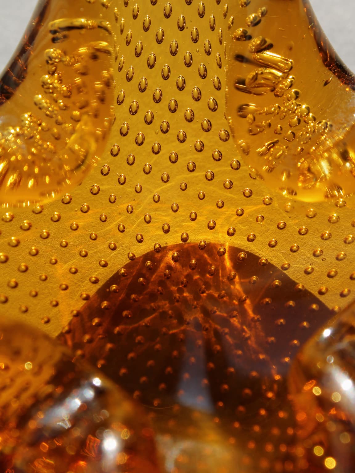 Amber Murano glass ashtray bubble texture detail view 1960s