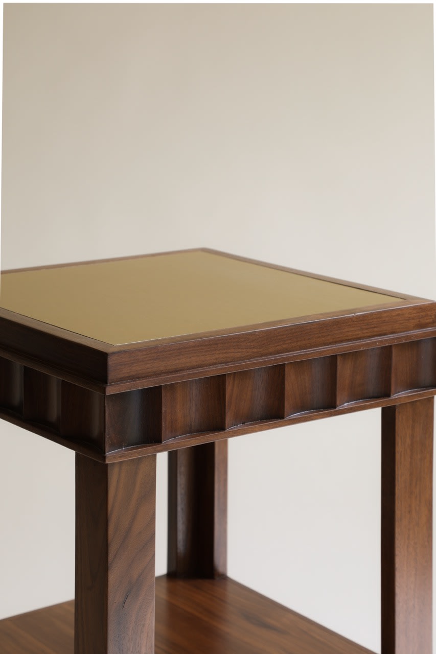 Grand Polène Side Table — close-up of wooden frame with brass top