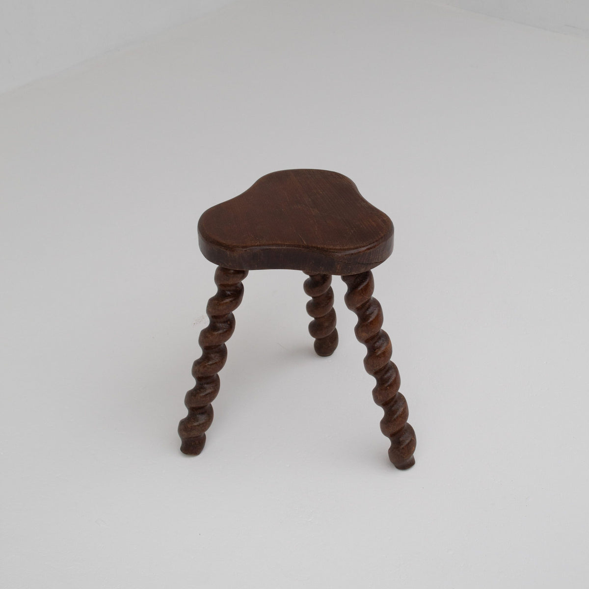 Set of 4 Primitive Oak Stools with Spiral Legs — side angle