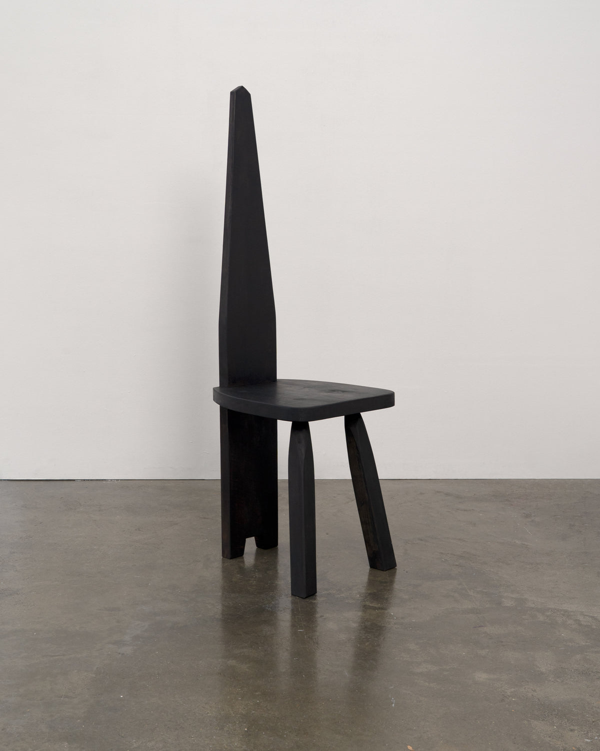 Brutalist High Back Chair — side view against a neutral wall