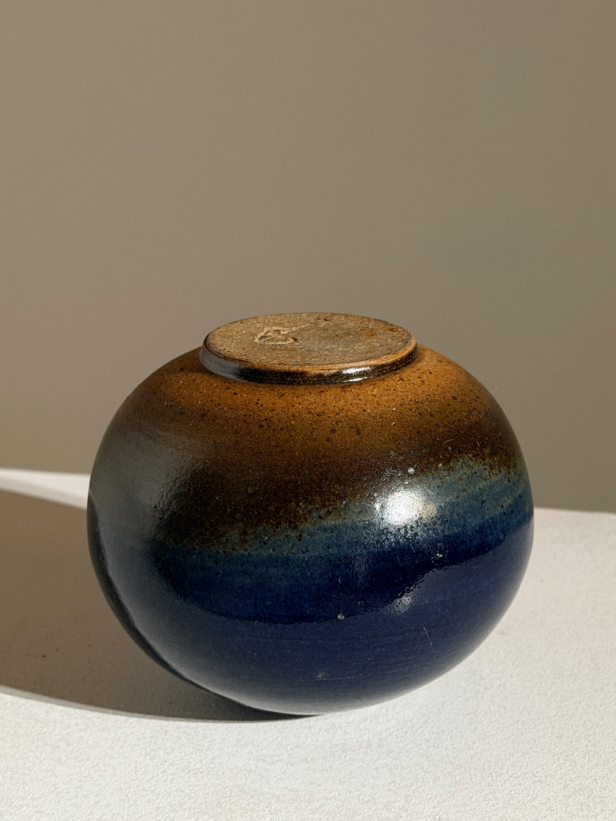 Small round stoneware soliflore vase, France, circa 1960.  — close-up