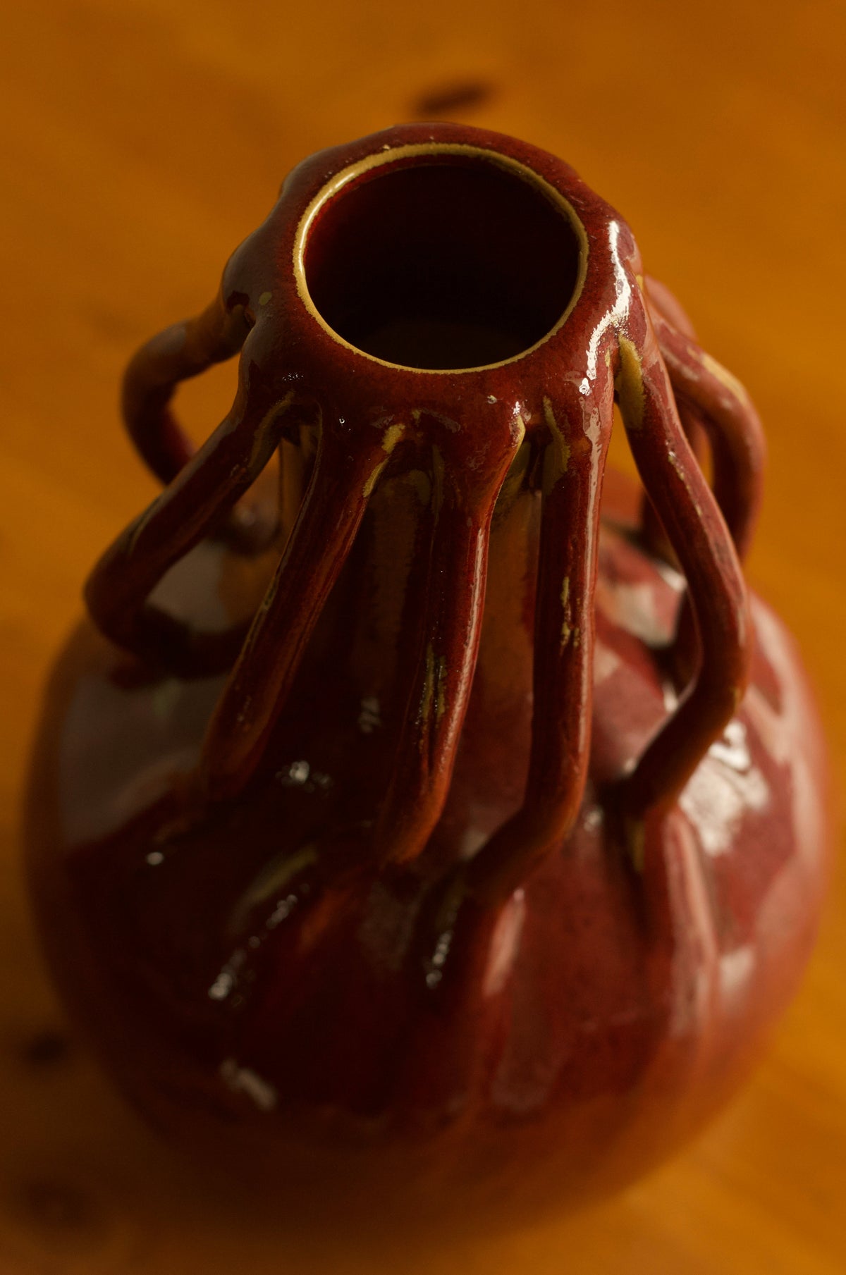 Oxblood Ceramic Loop Vase — side angle