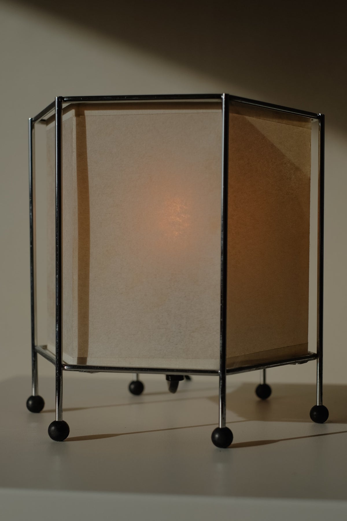 Japanese Rice Paper Table Lamp — angled view with warm light glow