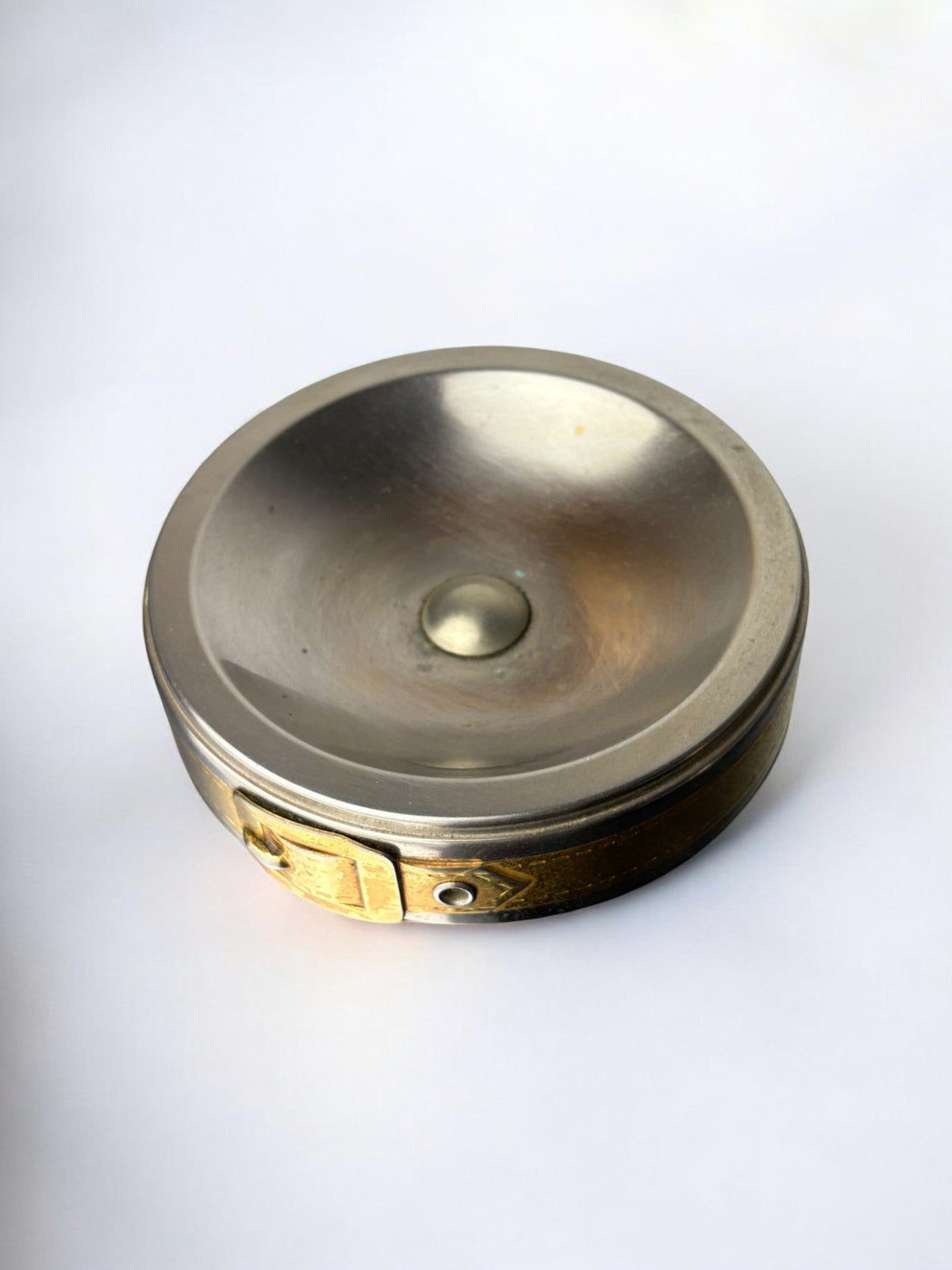 Belt Buckle Ashtray, France, 1970's — side angle showing polished metal finish