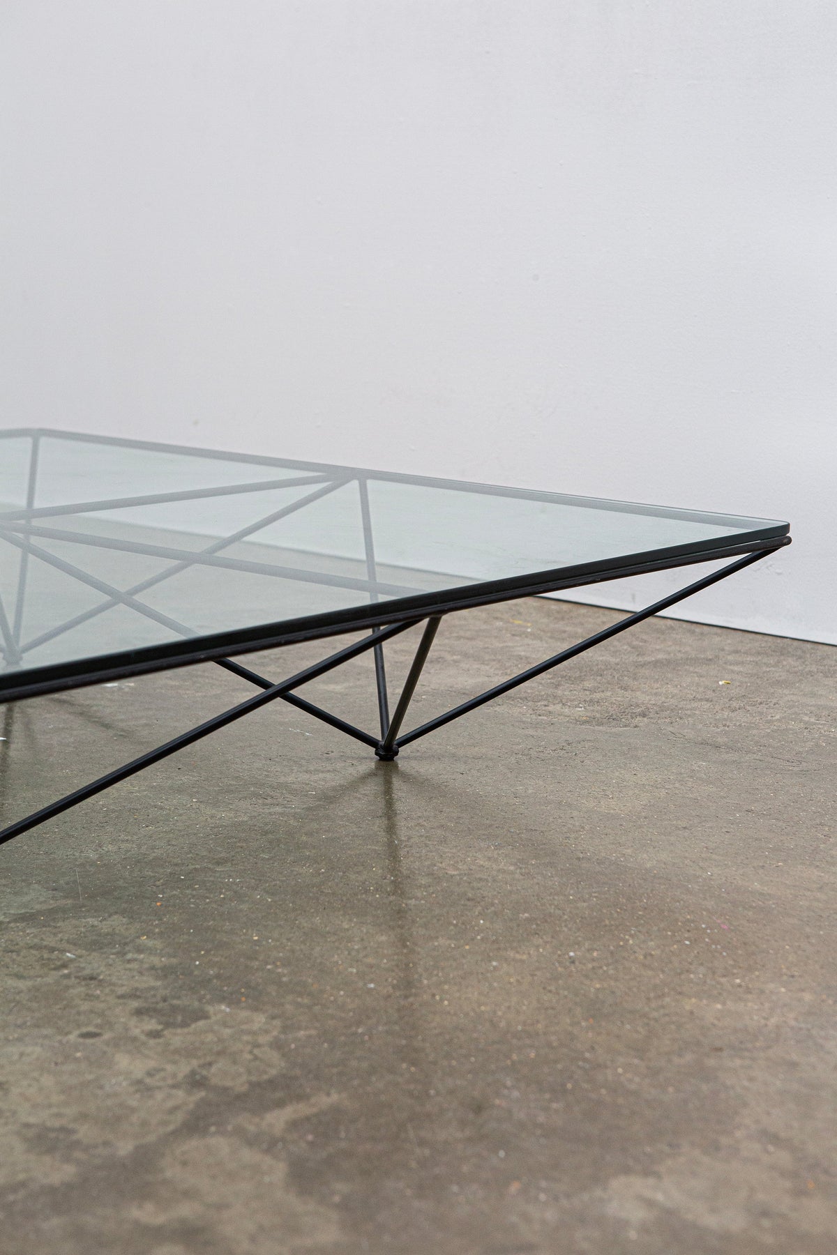 Alanda Coffee Table by Paolo Piva for B&B Italia, c.1980 — angled view of glass top with black metal base