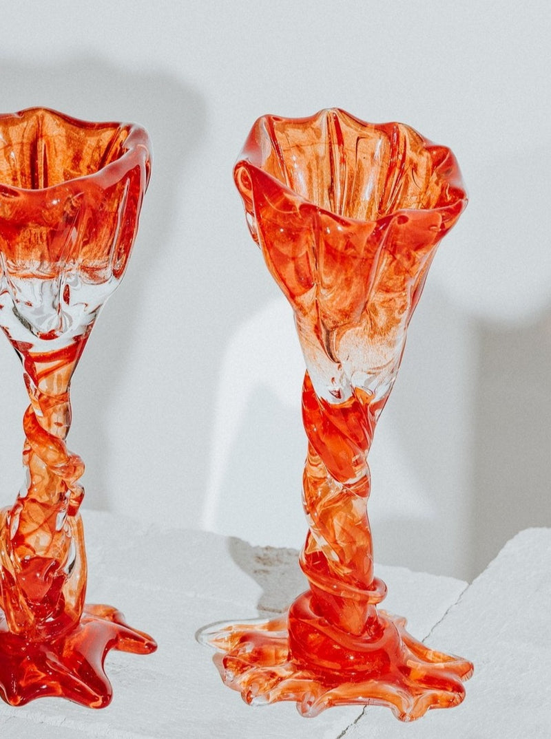 Hand-blown red spiky cocktail glass with unique design and texture