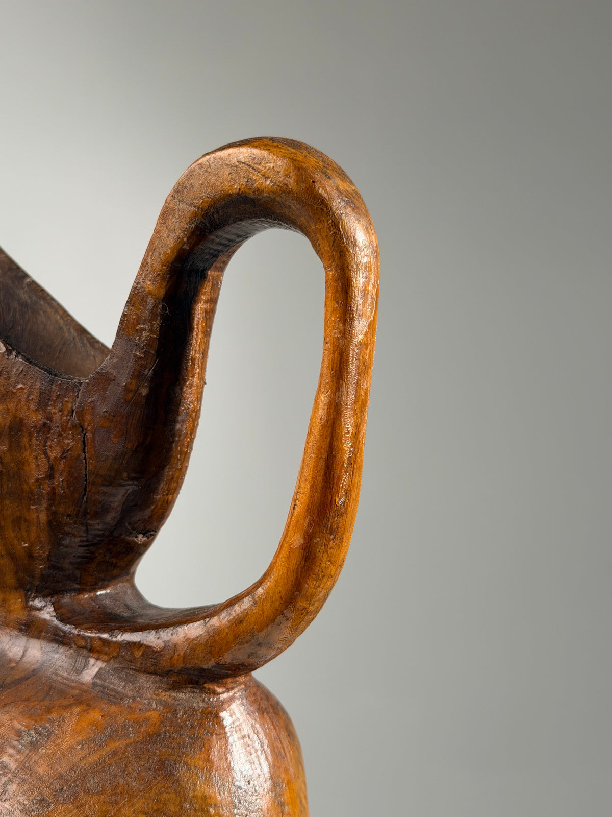Carved olive wood pitcher, France, early 20th century.  — lifestyle setting