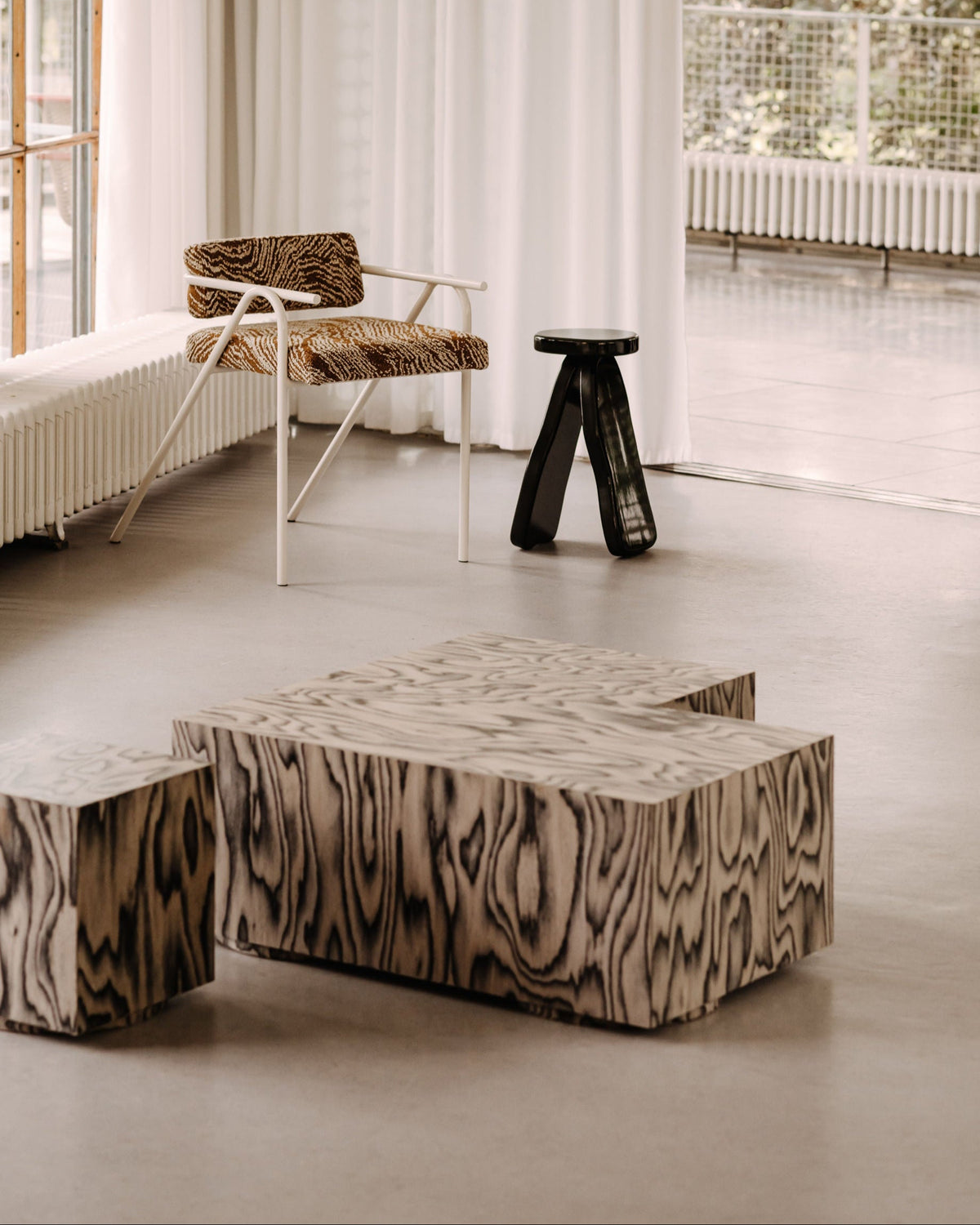 Coffee Table Object108 in ALPI veneer by Sottsass — side angle in modern interior setting