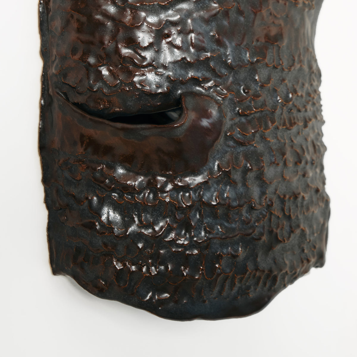 Casa Wall Light No3 — back view highlighting textured dark ceramic surface