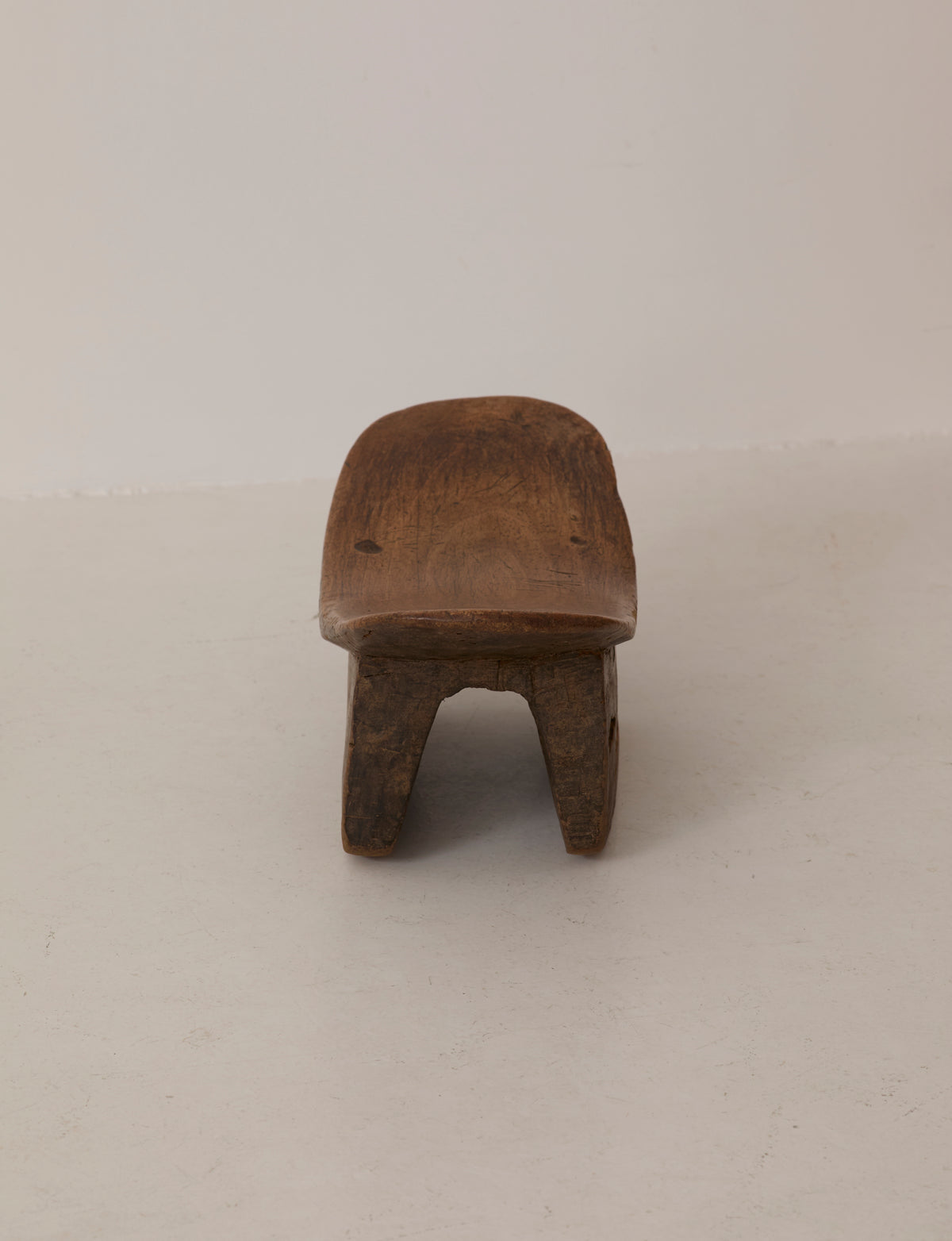 Mid-Century African Senufo Stool in Solid Wood — top view of handcrafted wooden seat