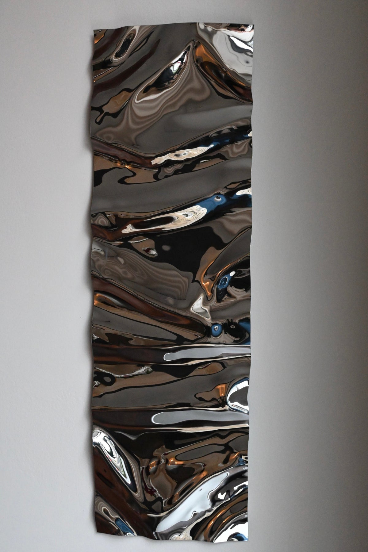 Psychedelic Mirror Long — top view of reflective metallic surface