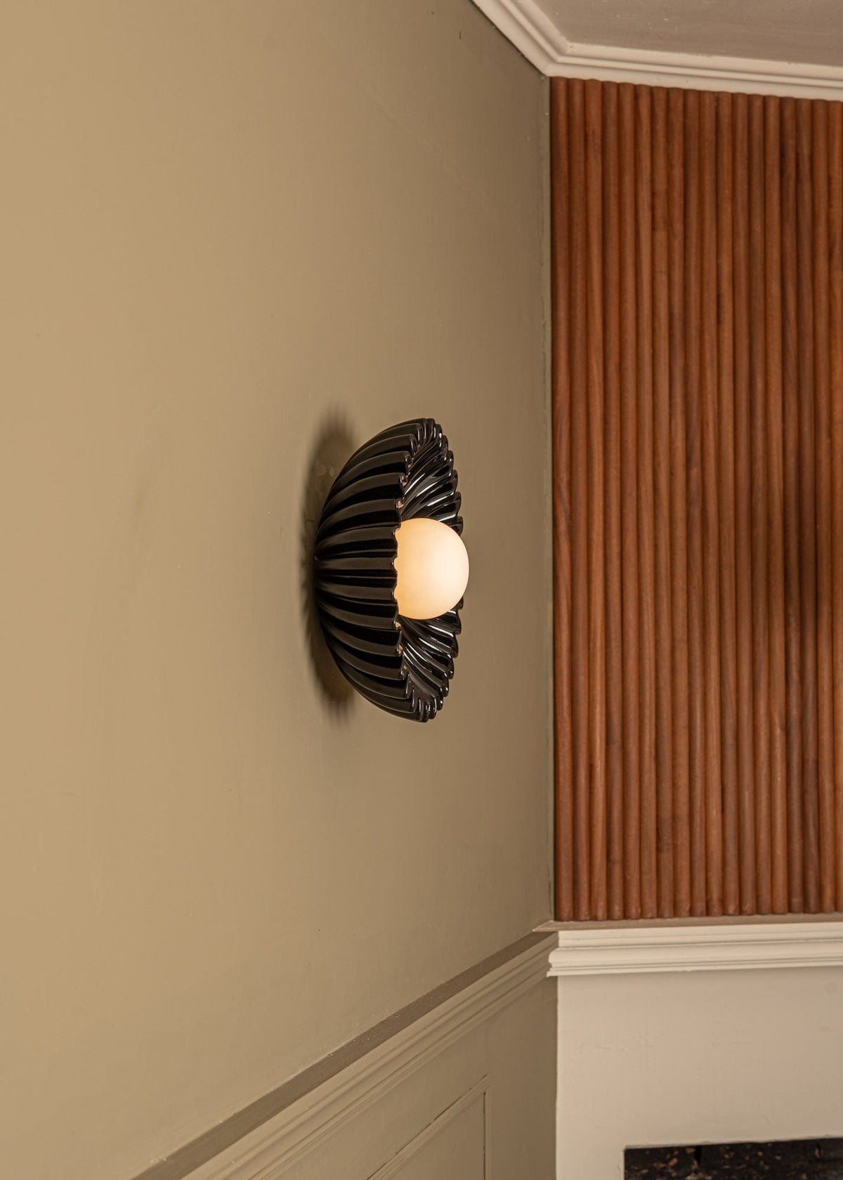'Ostro' Wall Light  in Black Ceramic — lifestyle setting