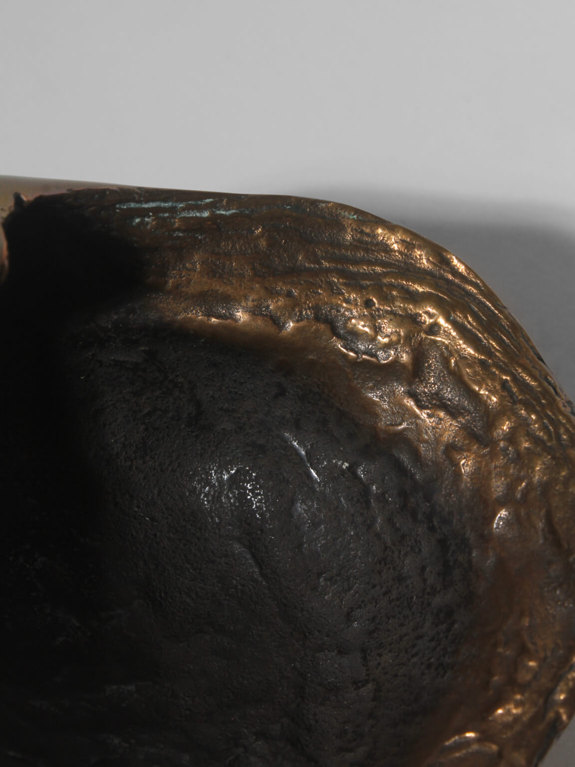 Antique Bronze Shell Bowl Sculpture — side angle