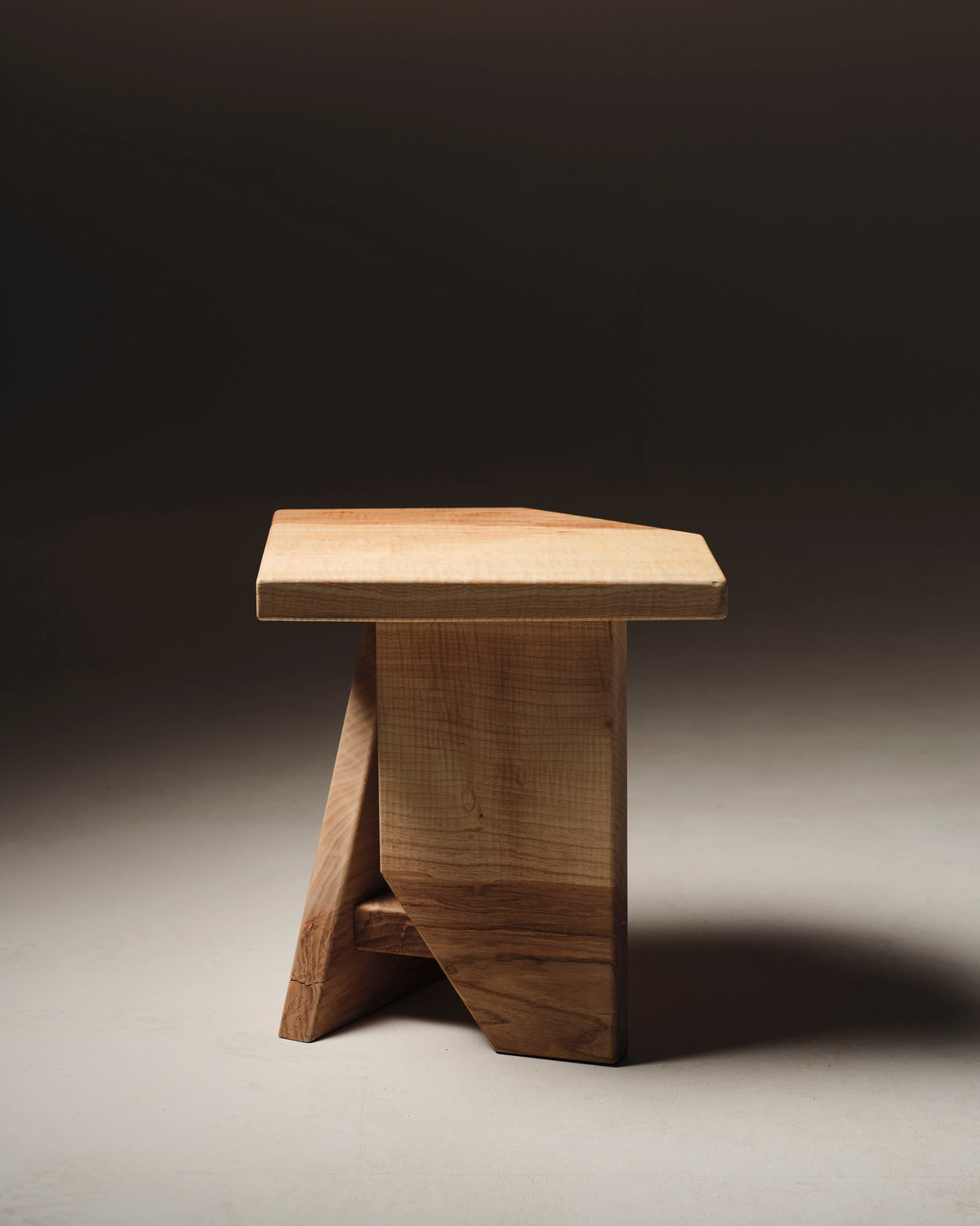 Handcrafted maple stool with trestle base design by Studio Gypsandconcrete