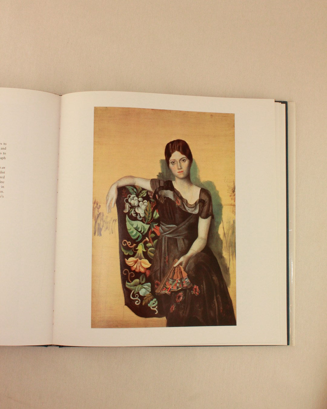 PICASSO 'THE MASTERWORKS' — open book on neutral fabric background