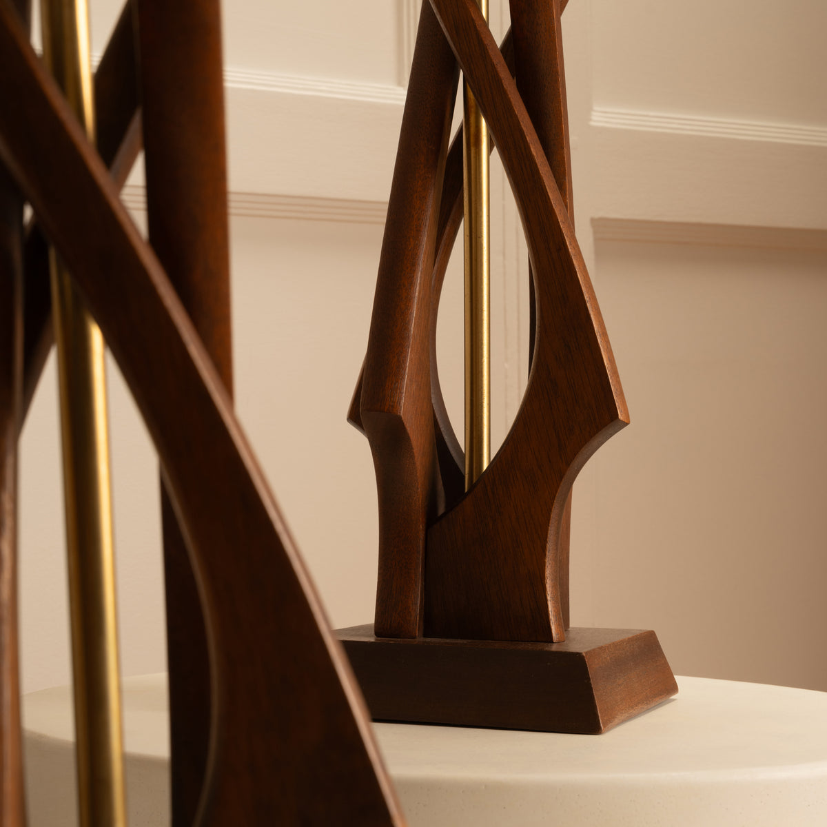 Sculptural organic wood table lamp detail showing curved branching form