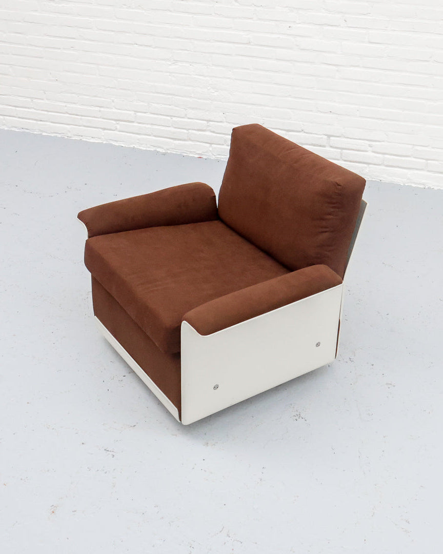 Brown leather Dieter Rams 620 armchair with white fiberglass base