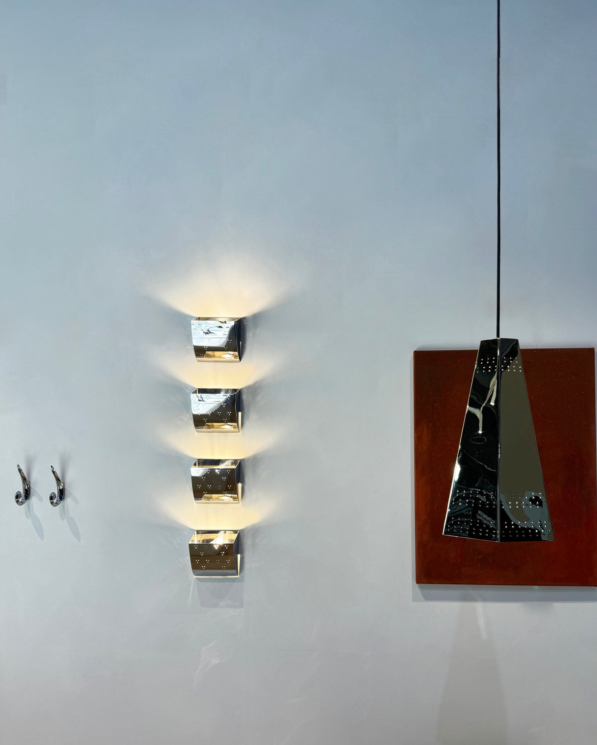 Jolene Wall Lamp - Polished Brass — top view showing polished brass finish on wall