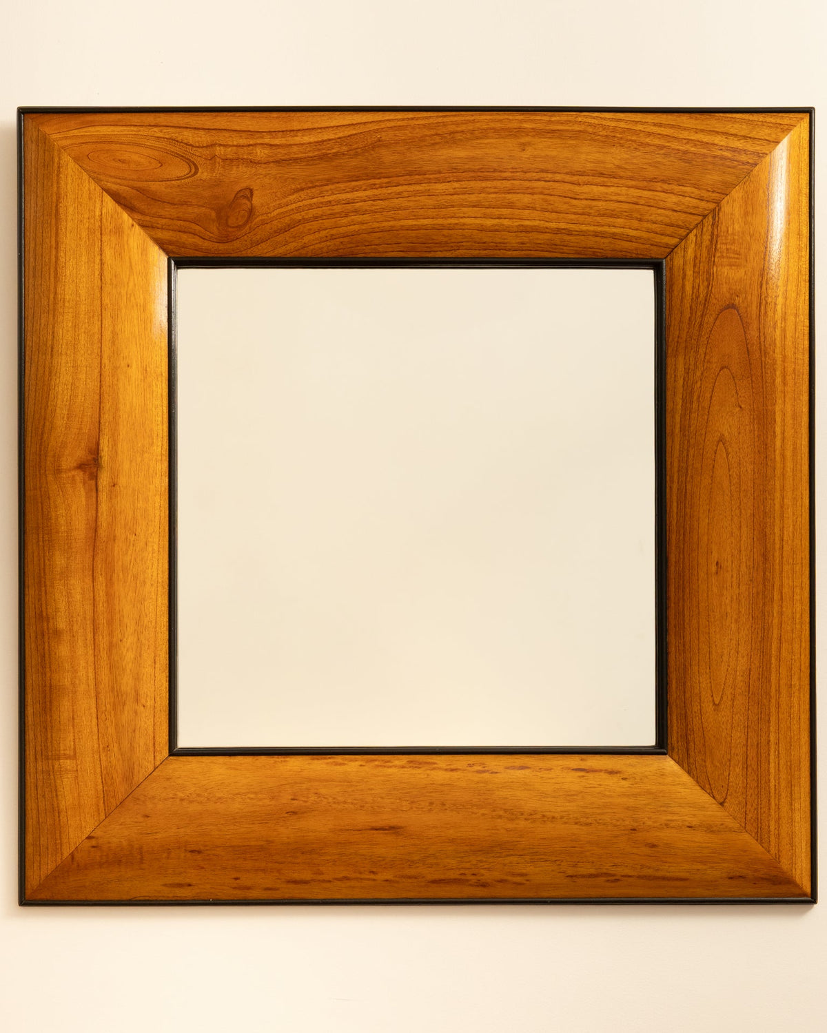 Wooden frame detail of 1950s Italian mirror showing wood grain