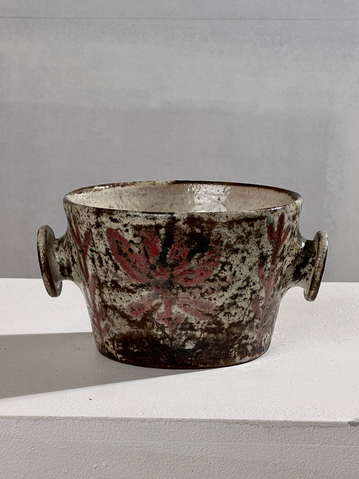 Vintage ceramic bowl with weathered glaze and handles by Reynaud