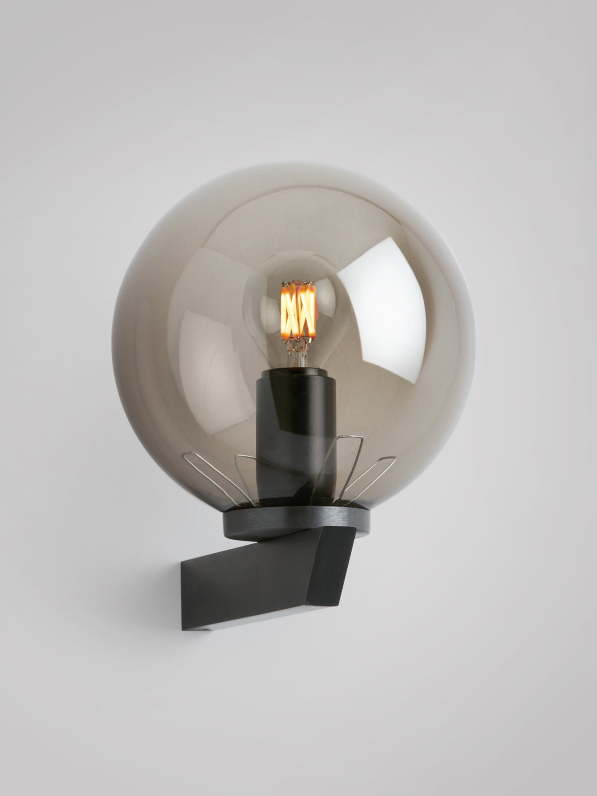 GAIA Wall - Flush — back view showing black metal base and glass globe