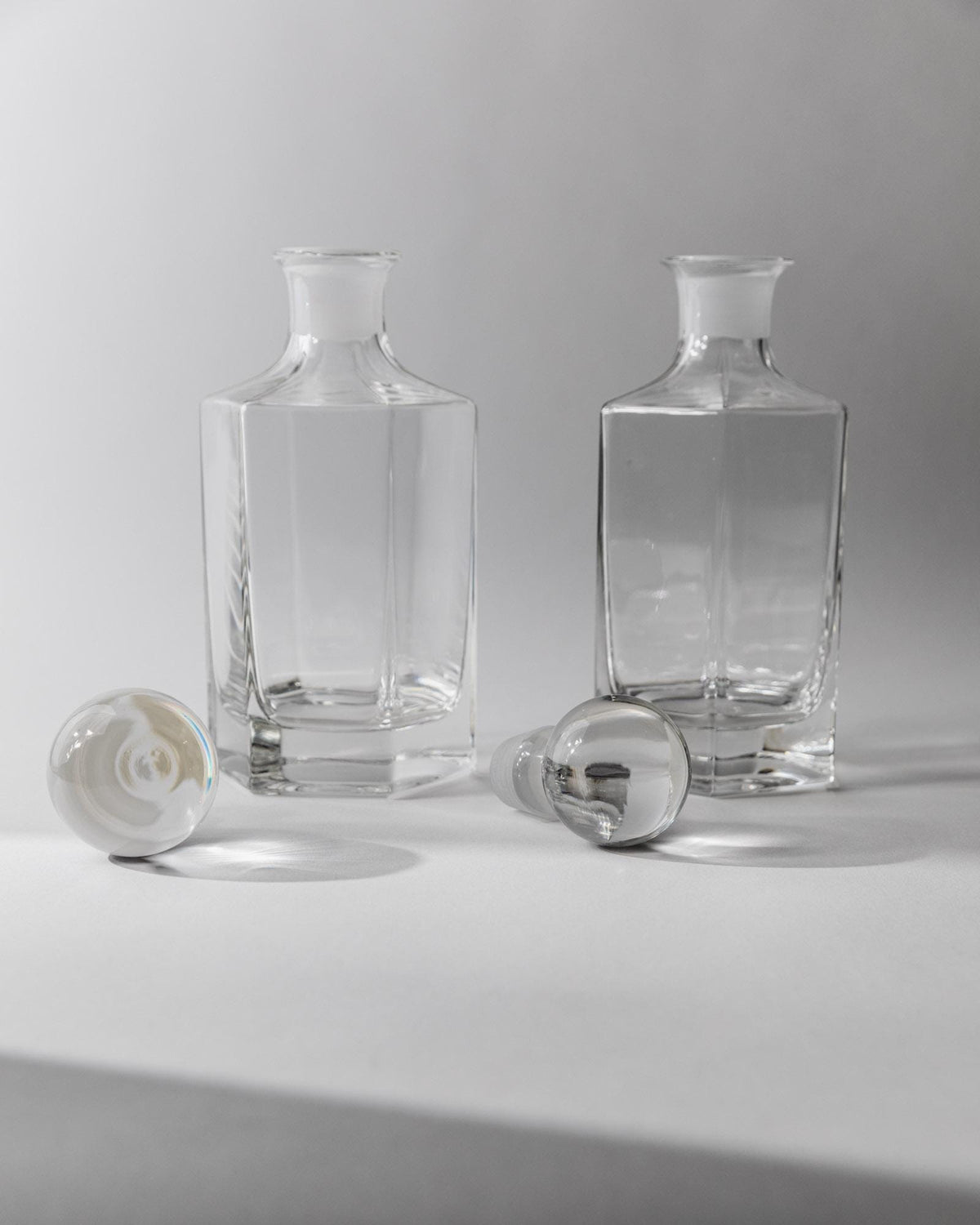 1970s Glass Decanter Set of 2 — side angle with clear glass decanters