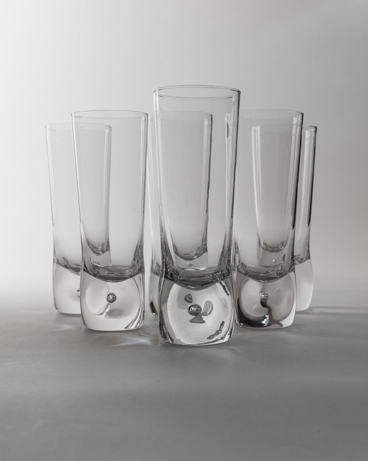 Set of 6 Vintage Murano Glasses, Italy 70s — side angle showing clear glass with rounded bases