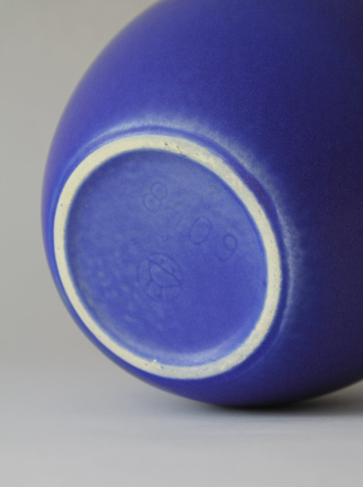 Bottom view of German 60s cobalt blue ceramic matte vase