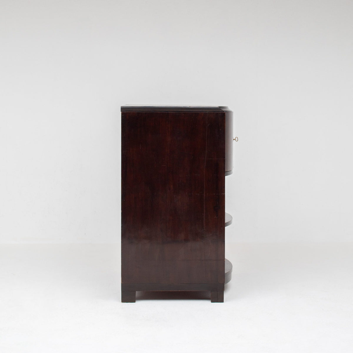 Art Deco Cabinets — side profile of dark wood nightstand