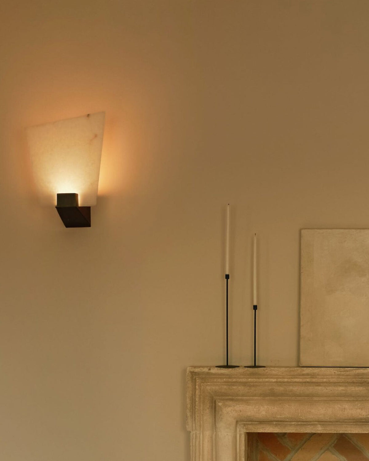 Modern geometric wall light with warm ambient glow in contemporary interior