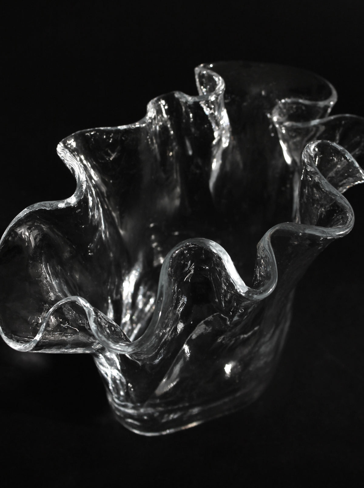 Crystal clear Finnish glass vase with flowing sculptural form