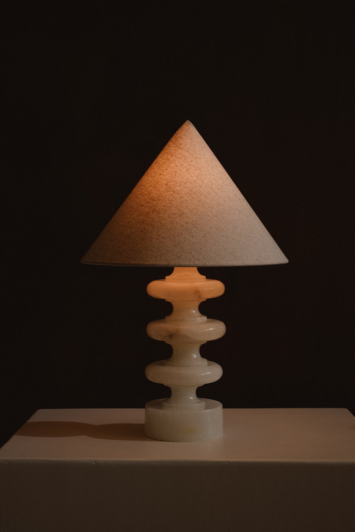 Sculptural Alabaster Table Lamp — front view with warm light glow