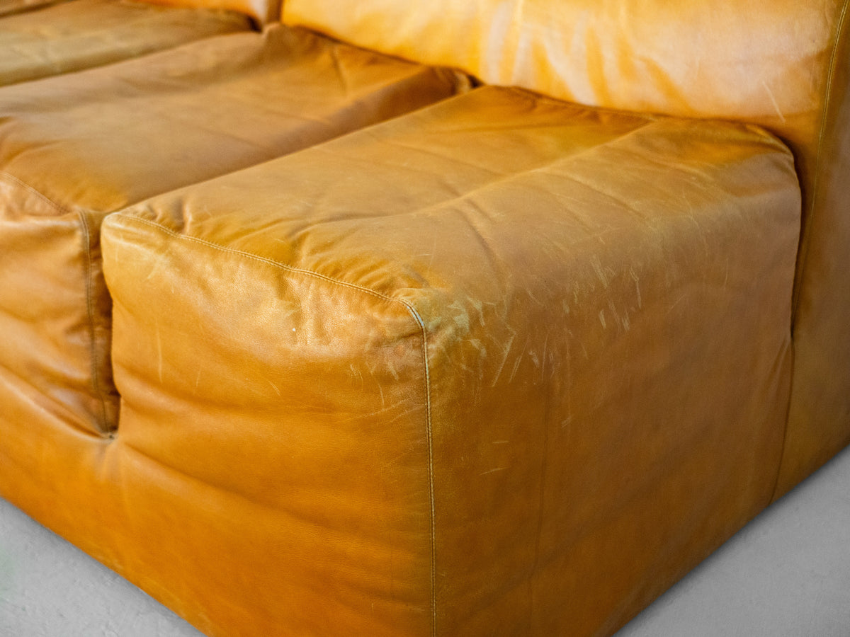 Tan leather Ipercubo sofa detailed view showing seat cushions