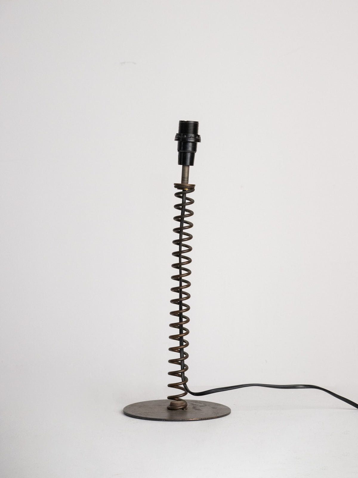 Coil Spring Table Lamp in Patinated Iron with Linen Shade, European, Second Half of the 20th Century — lifestyle setting