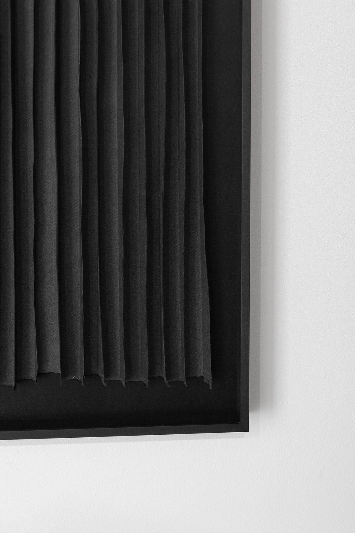 Rhythm Black' Paper Composition — side angle showing textured black paper layers