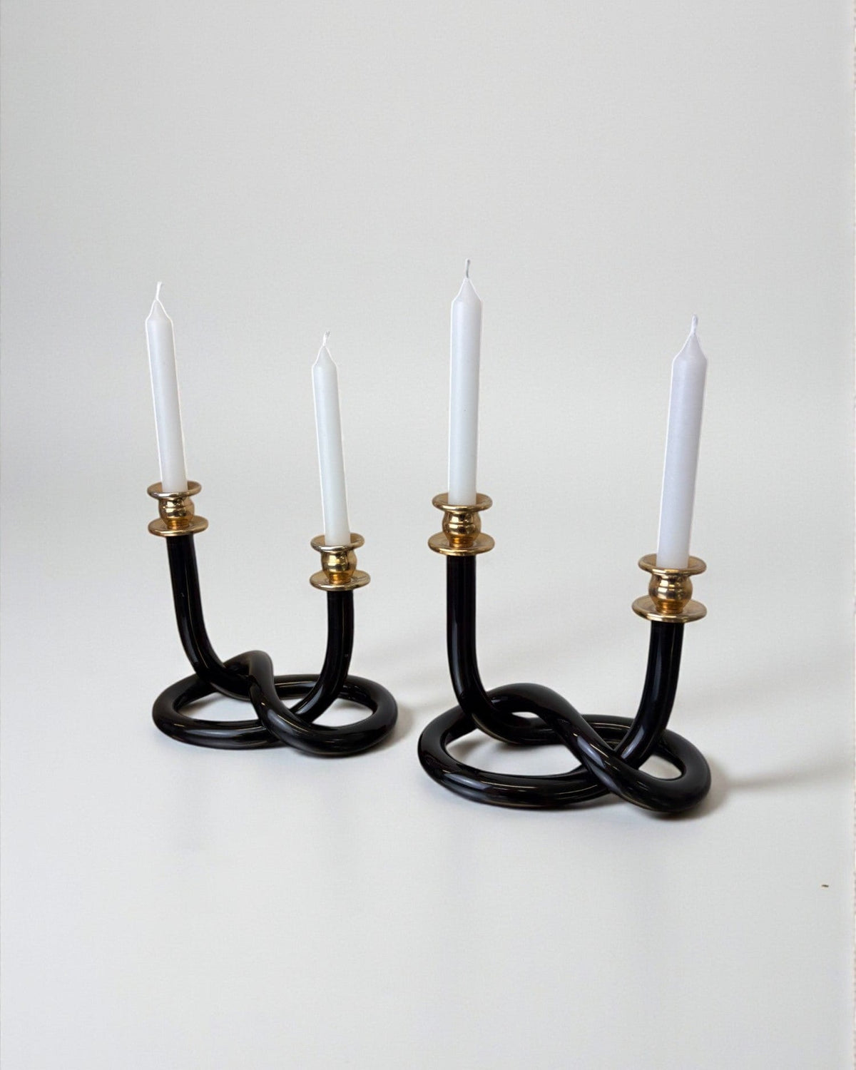 Pair of Black Candleholders by Dorothy Thorpe, 1970s by Malamar Studio | The Oblist — vintage black glass and brass