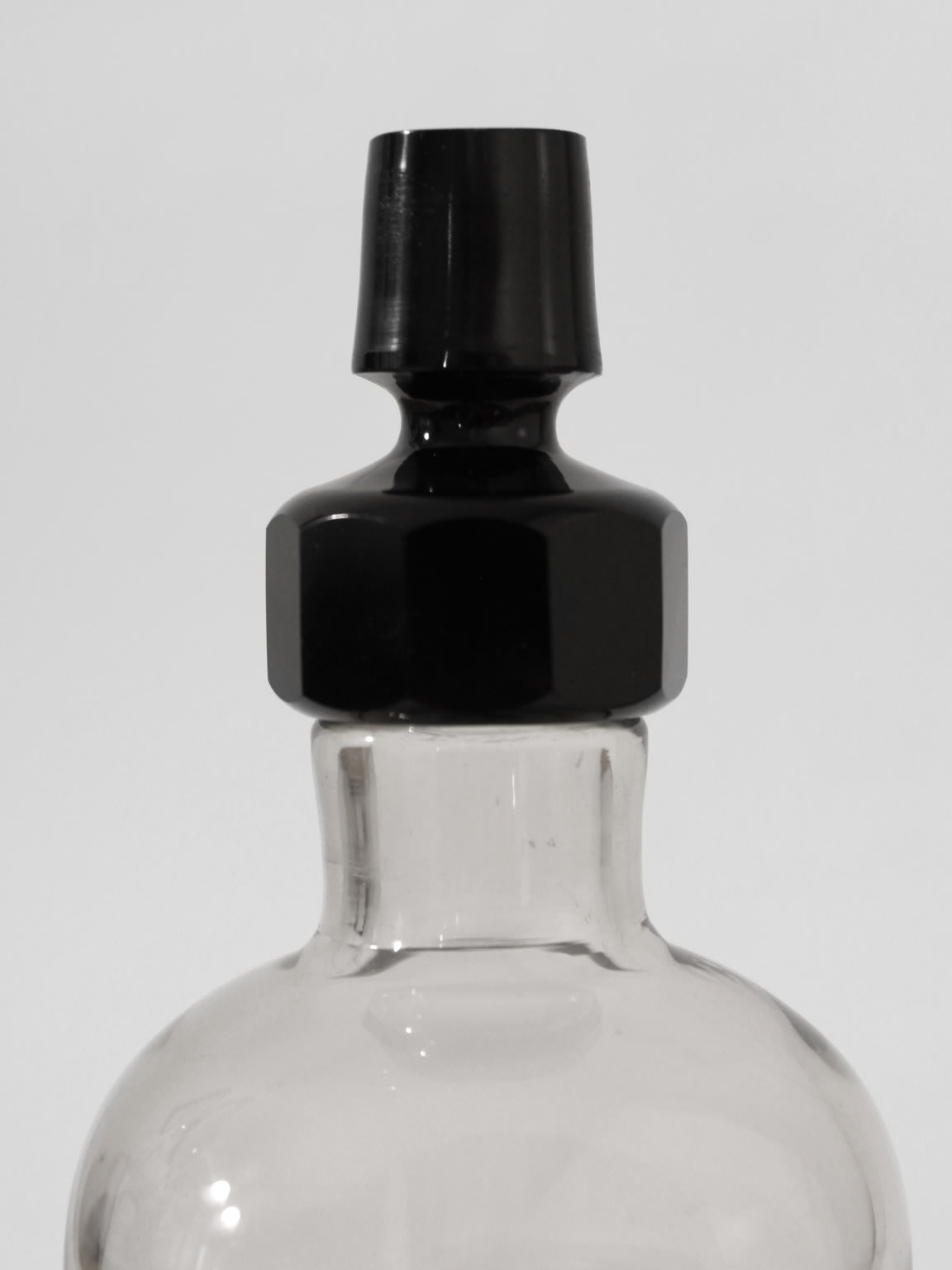 Smoky Black Mid-Century Glass Decanter — close-up of black stopper and glass body