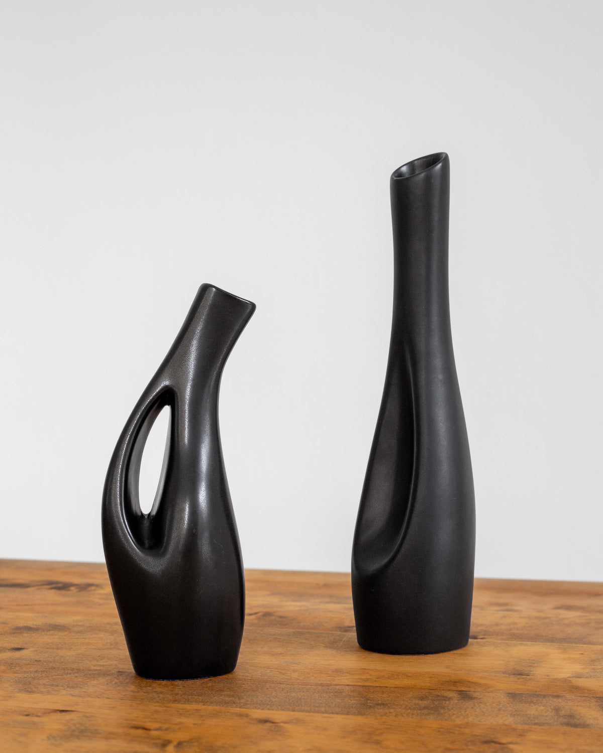 Collection of Black Sculptural Vases, Swedish Mid-Century Modern — angled view on wooden table