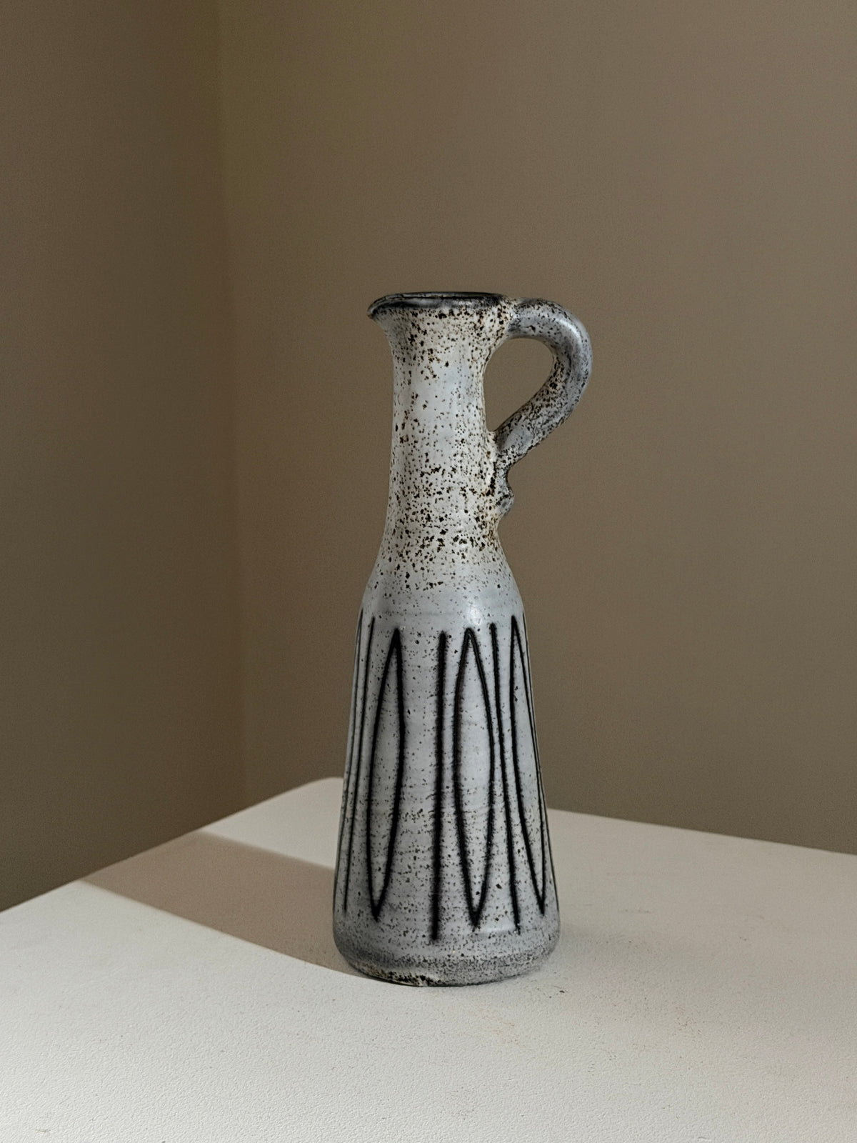 Small handled pitcher by Jacques Pouchain, Dieulefit, France, circa 1960.  by Figuresdesign | The Oblist