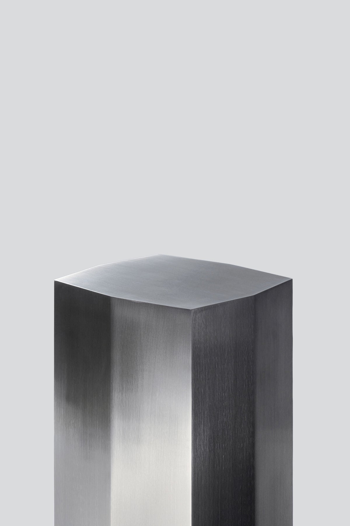 Ame II' Steel Pedestal — close-up of brushed steel surface