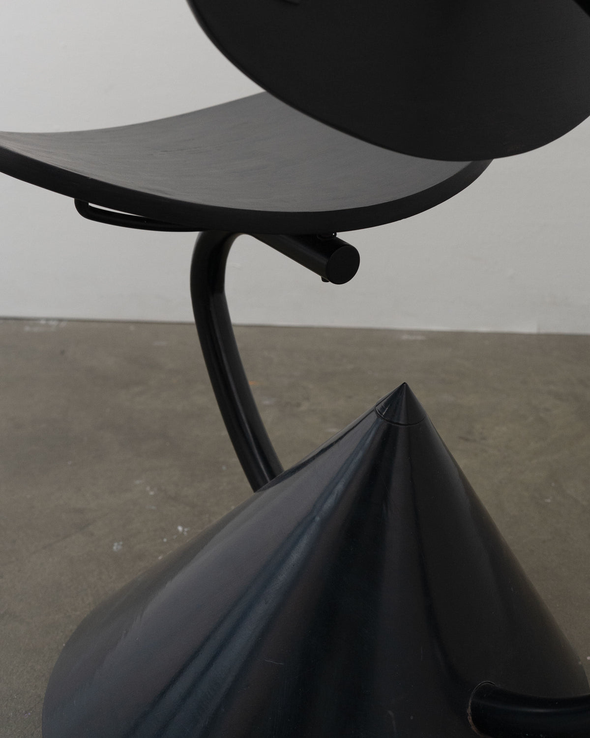 Hotel Zeus Chair by Ron Arad for Zeus, 1992 — angled view highlighting black metal base