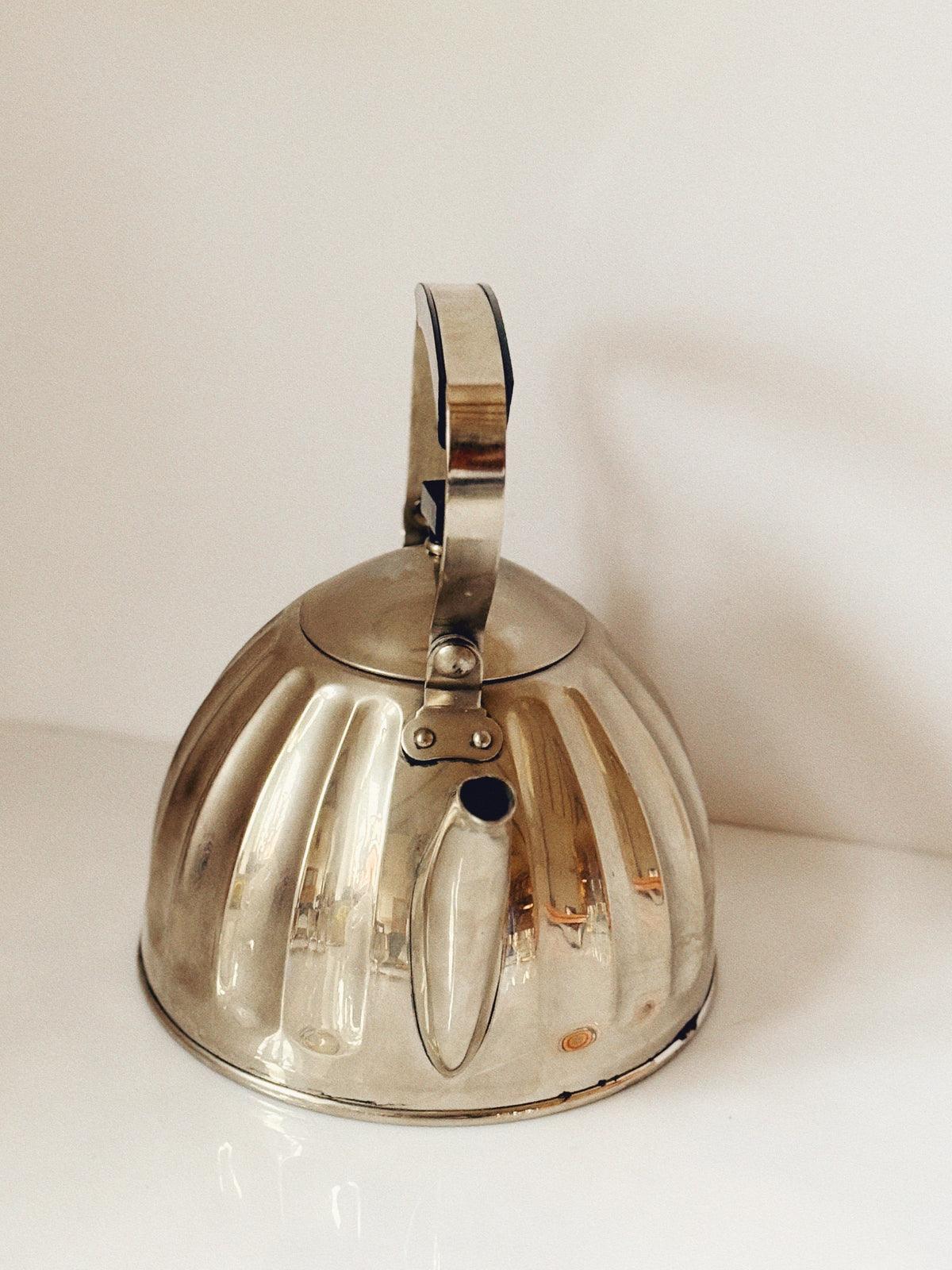 Mid Century Metal Kettle with Bakelite Handle, Gusev Russia — side angle showing polished metal surface