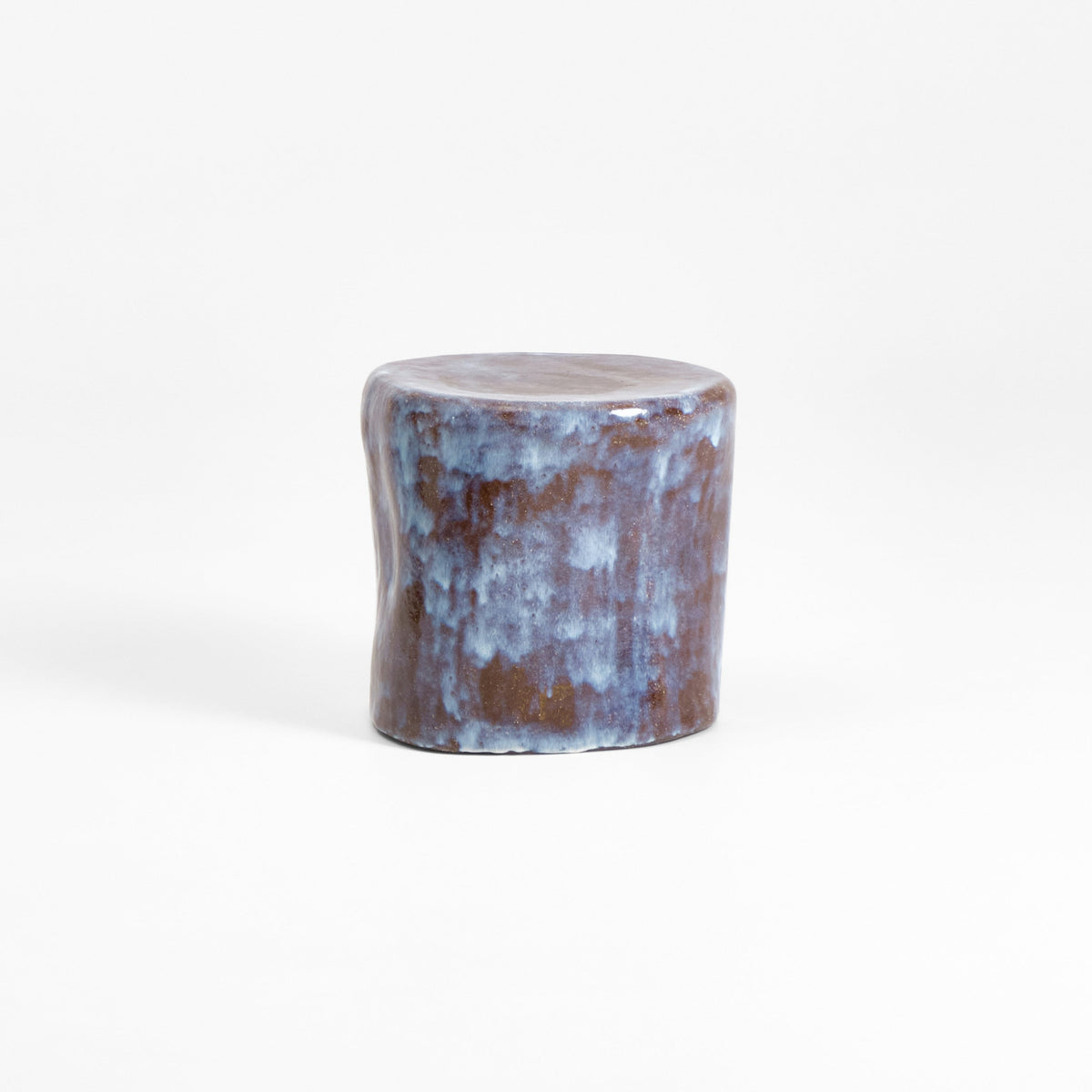 Small Ceramic Side Table — angled view highlighting blue glaze finish