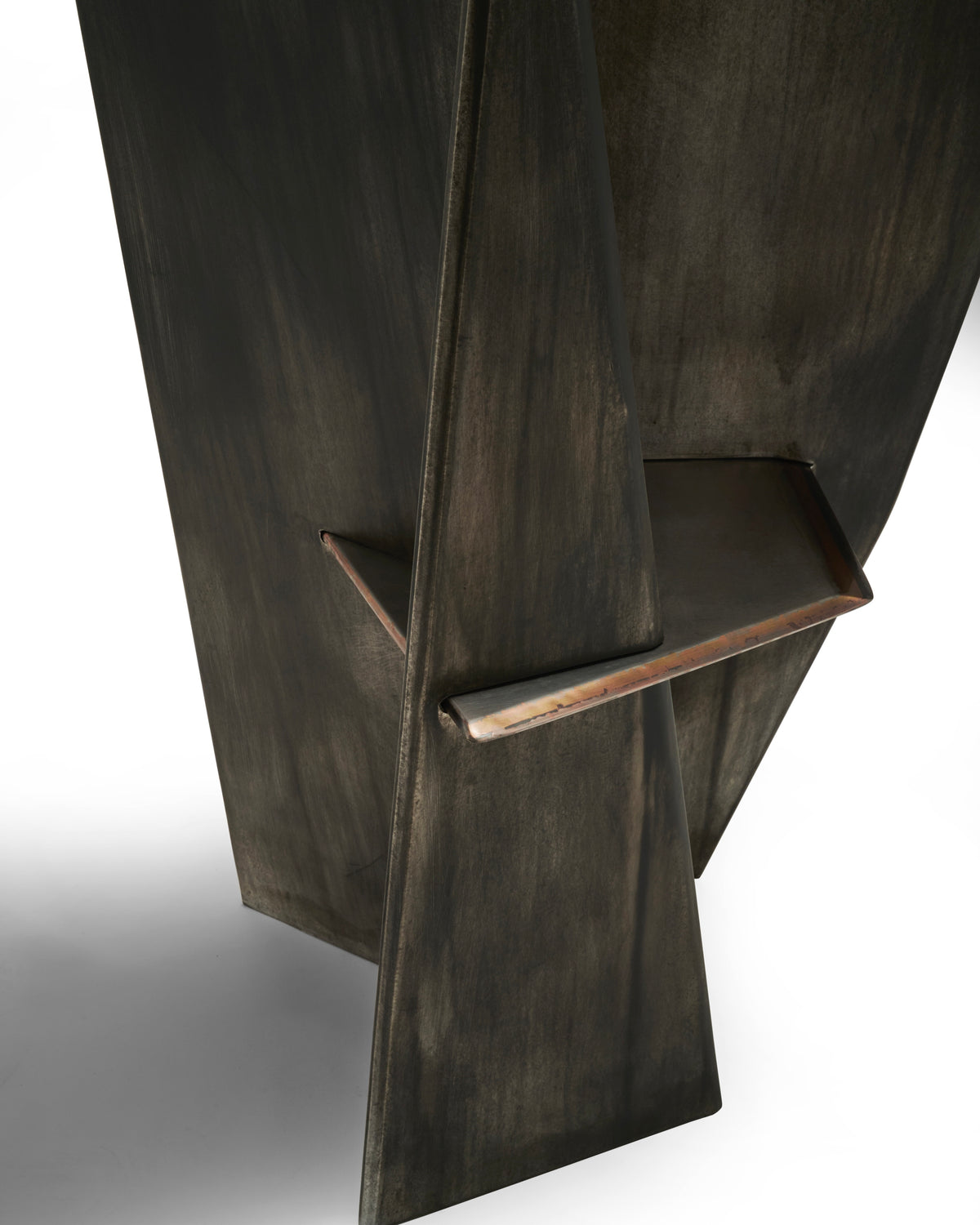 HARAKIRI Conceptual Chair in Metal and Steel — angled view highlighting dark metal finish