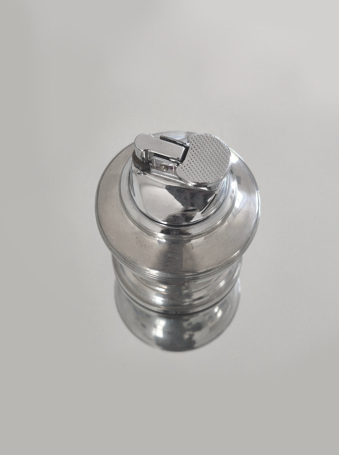 Pewter Lighter — back view showing polished metal finish